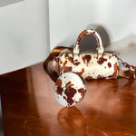 Confident Pearl - Brown Cow Print