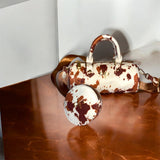 Confident Pearl - Brown Cow Print